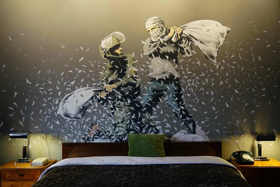 Room number three is seen as a highlight, with a sketched image of a Palestinian and an Israeli having a pillow fight adorning the wall. (AP)
