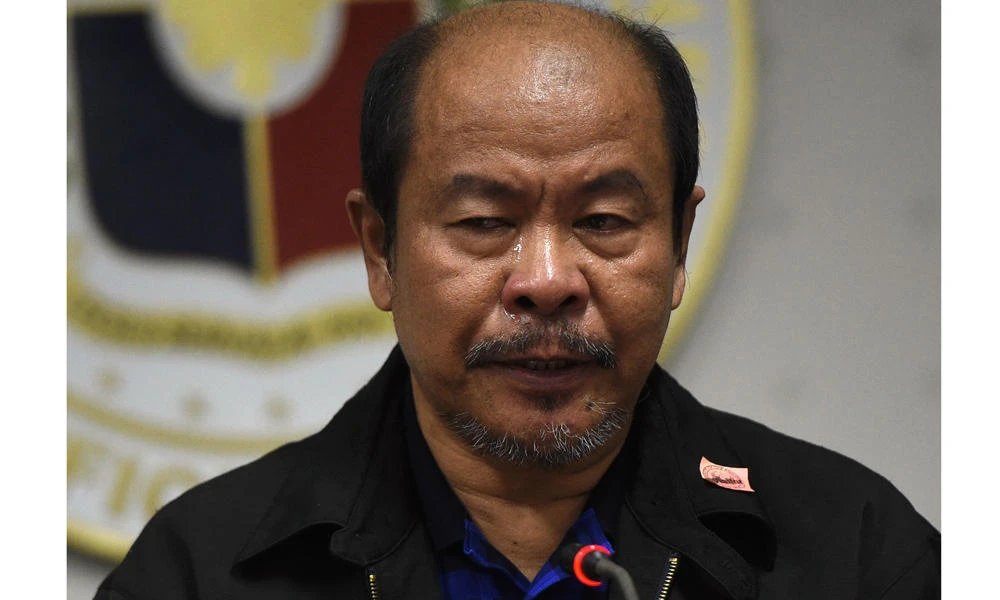 In this taken on February 20, 2017, former Philippine police officer Arthur Lascanas confesses during a press conference in Manila to a litany of brutal crimes allegedly ordered by President Rodrigo Duterte when he was the mayor of the southern city of Davao. Lascanas repeated his confession under oath on Monday at the start of a Senate investigation. (AFP / TED ALJIBE)