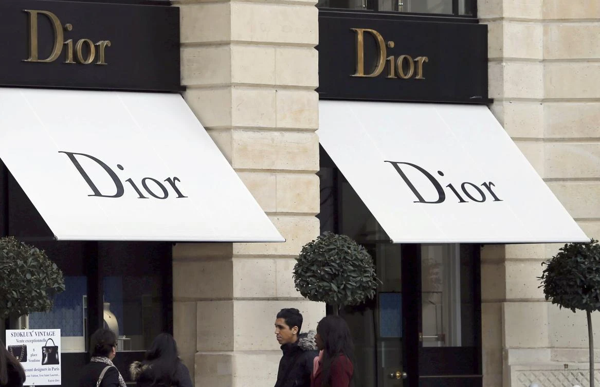 Logos of Dior brand are seen outside a Dior store in Paris, France, March 3, 2017. (Reuters)