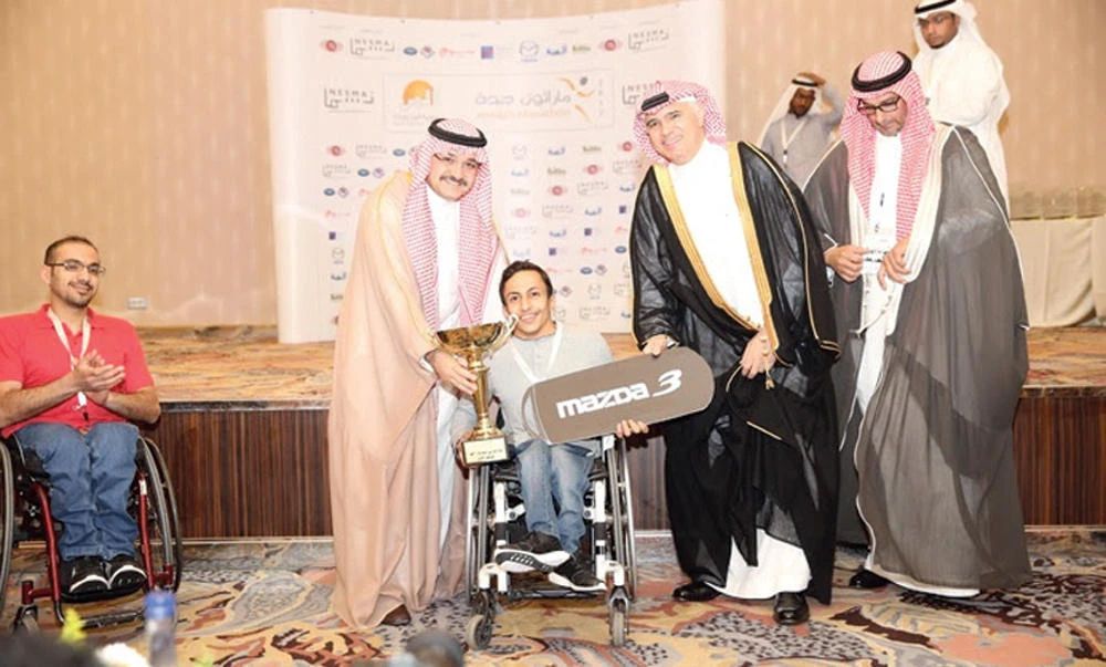 Saudi national Jamaan Al Saad Al-Zahrani, first place winner in the special needs wheelchair 21-km race.