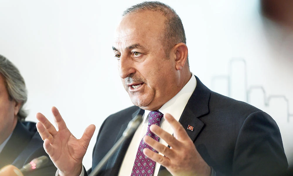 Turkish Foreign Minister Mevlut Cavusoglu gestures as he speaks during a meeting with Representatives of foreign missions on Tuesday in Istanbul. (AFP)