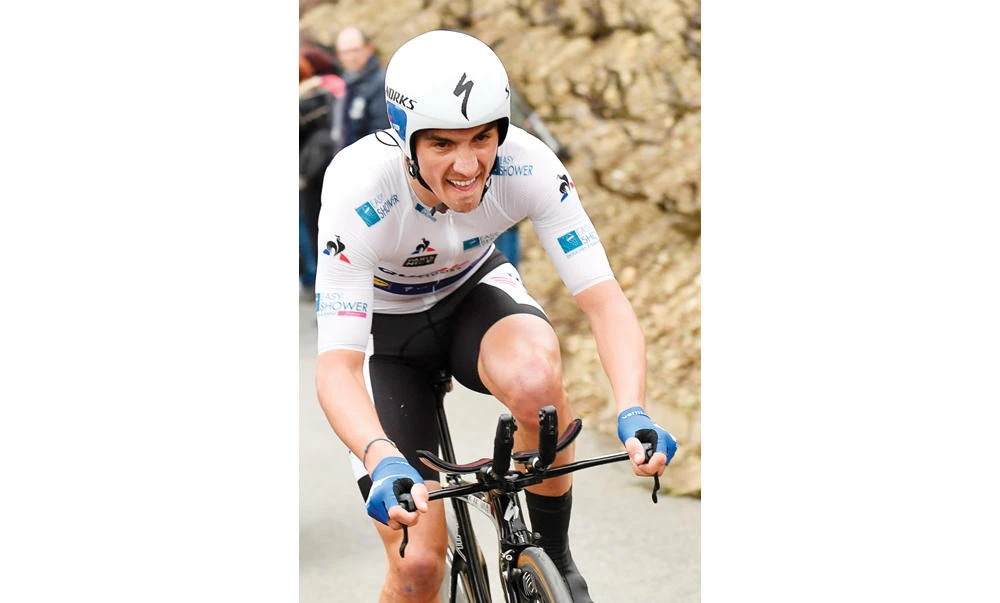 France’s Julian Alaphilippe on his way to a dominant victory in the 145km individual time-trial, the fourth stage of the 75th edition of the Paris-Nice cycling race, between Beaujeu and Mont Brouilly, on Wednesday. (AFP)