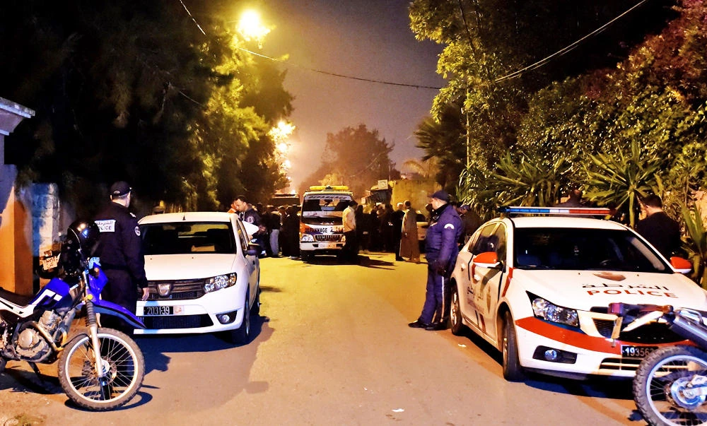 Moroccan police and authorities inspect the scene of the shooting of Abdellatif Merdas, a Moroccan parliamentarian who was gunned down and killed late on Tuesday near his home in the southern district of Californie, in Casablanca on March 8, 2017. (FP)