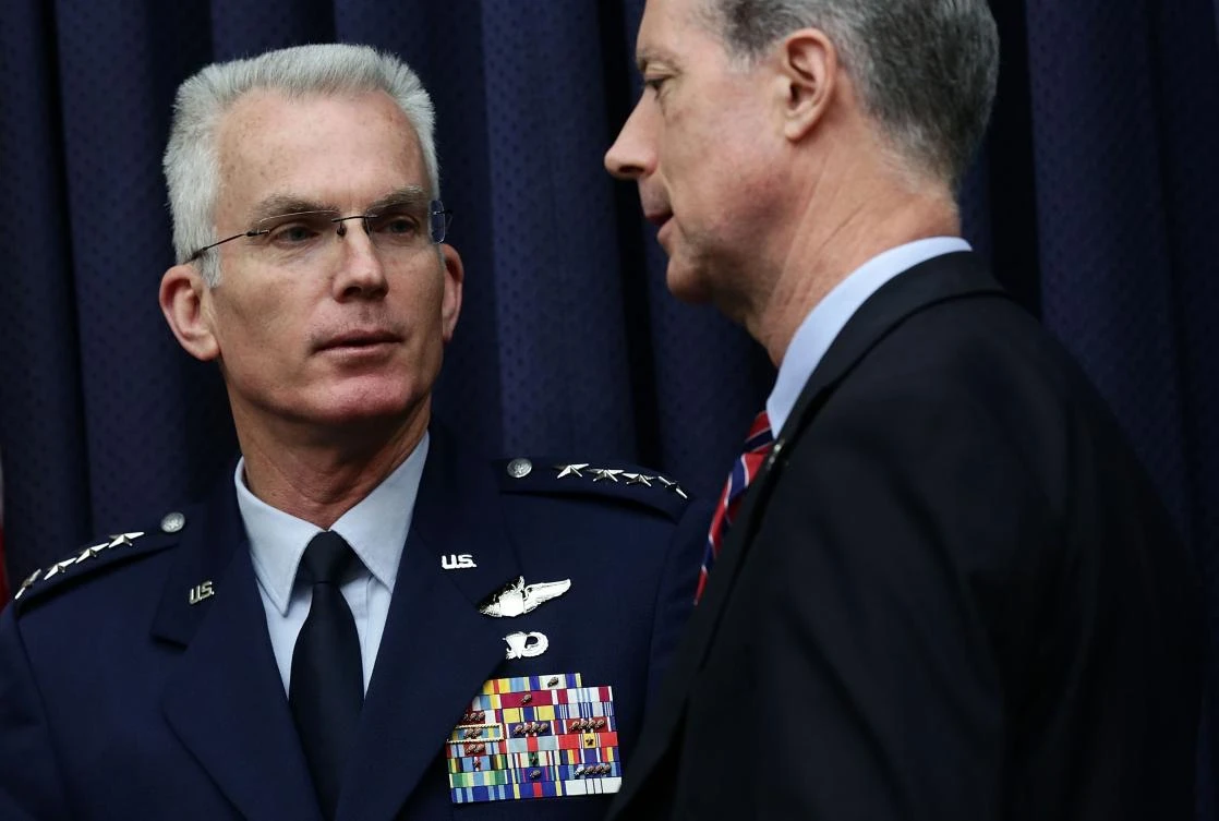 Vice Chairman of the Joint Chiefs of Staff Air Force Gen. Paul Selva (L) talks to committee chairman Rep. Mac Thornberry (R-TX) (R). (AFP)