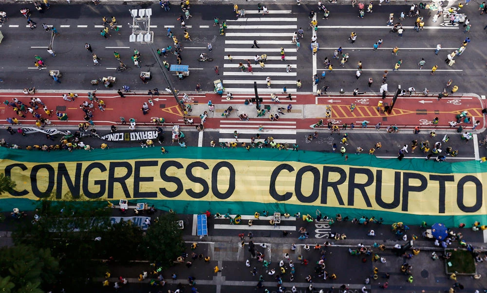 Demonstrators protest against corruption along Paulista Avenue in Sao Paulo, Brazil. (AFP)