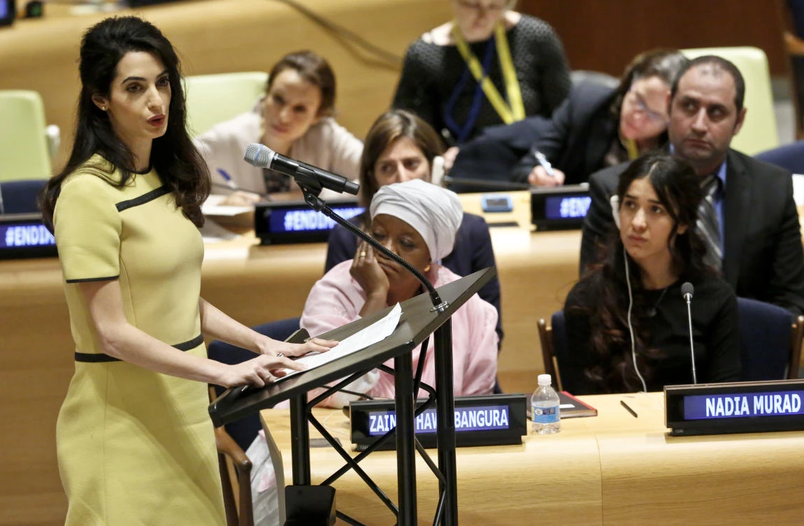 Human rights lawyer Amal Clooney, left, address a United Nations human rights meeting called "The Fight against Impunity for Atrocities: Bringing Da'esh to Justice," Thursday, March 9, 2017 at U.N. headquarters. (AP)