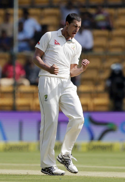 Australia's Mitchell Starc celebrates the dismissal of India's Abhinav Mukund during the first day of their second Test match in Bangalore, last Saturday. (AP)
