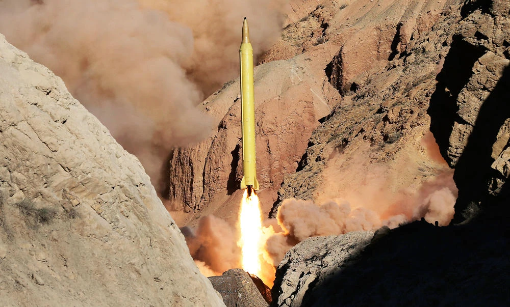 In this photo obtained from the Iranian Fars News Agency, a Qadr H long-range ballistic surface-to-surface missile is fired by Iran's Revolutionary Guard, during a maneuver, in an undisclosed location in Iran, in this photo taken on March 9, 2016. (AP)