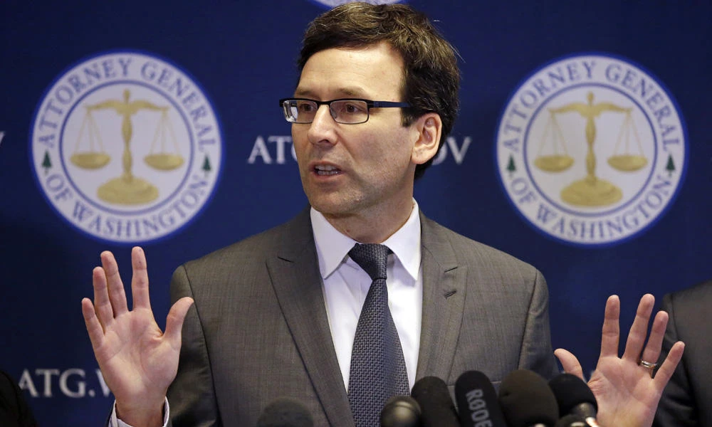 Washington State Attorney General Bob Ferguson speaks at a news conference about the state's response to President Trump's revised travel ban on March 9, 2017, in Seattle. (AP Photo/Elaine Thompson)