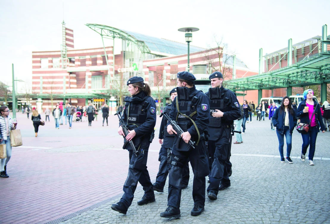 Police officers walk near Centro mall in Oberhausen, Germany, on Saturday. (AP)