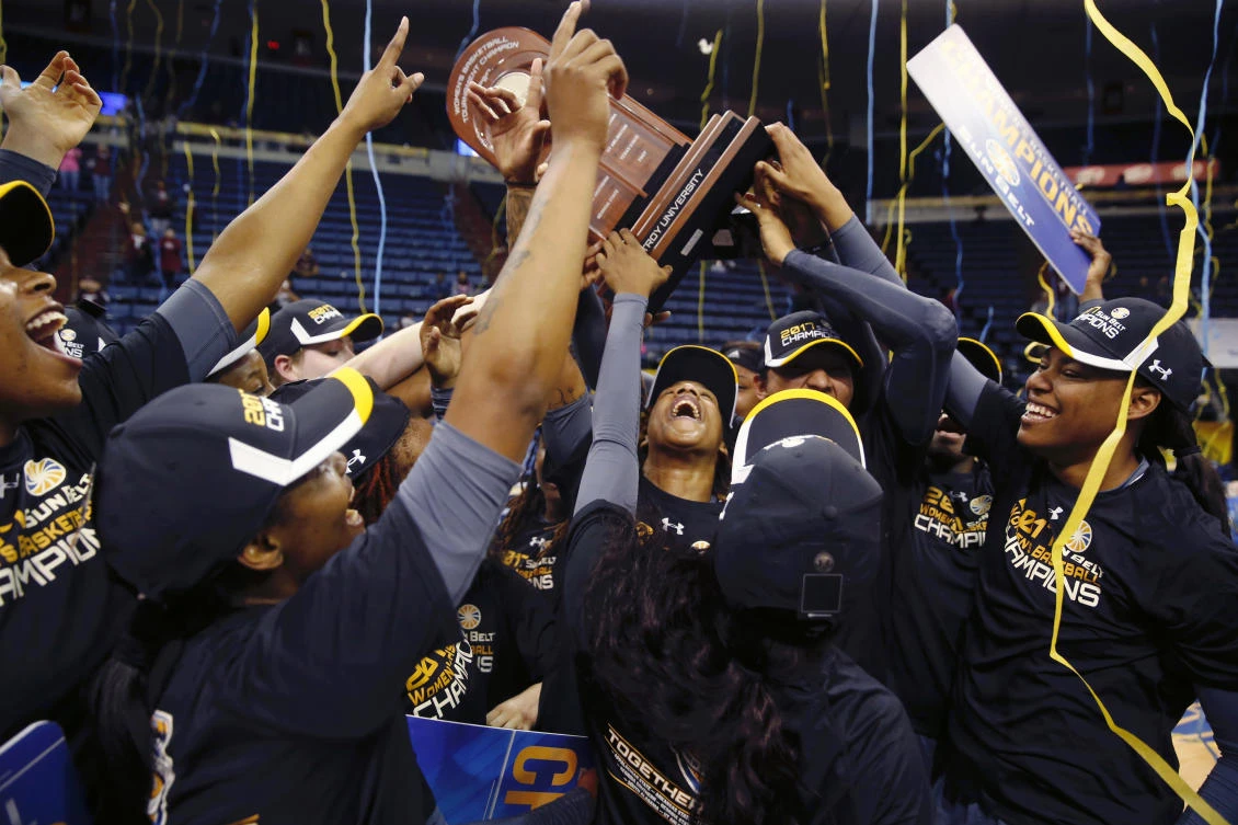 Troy celebrates after an NCAA college basketball game against Louisiana-Lafayette for the Sun Belt tournament title in New Orleans, Sunday. (AP)