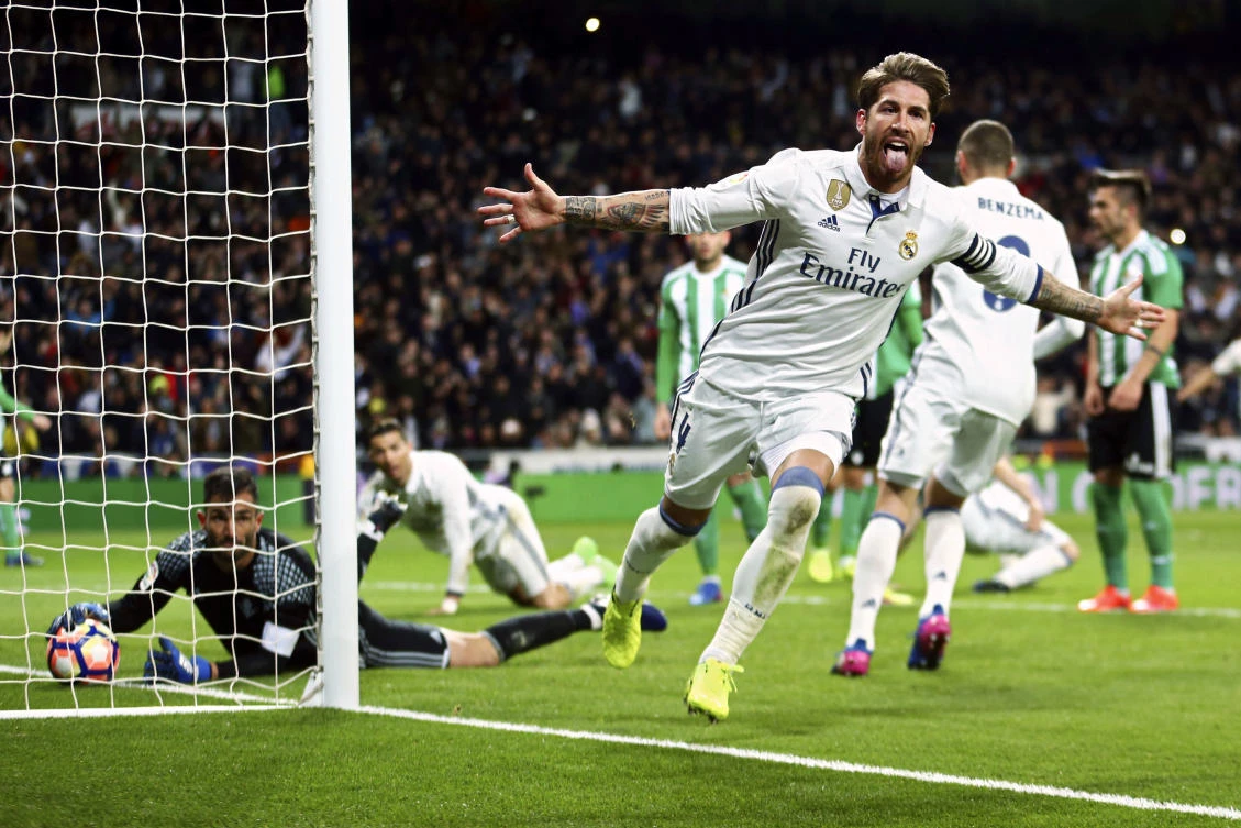 Real Madrid's Sergio Ramos celebrates after scoring his side's second goal against Real Betis during a Spanish La Liga soccer match at the Santiago Bernabeu stadium in Madrid on Sunday night. (AP)