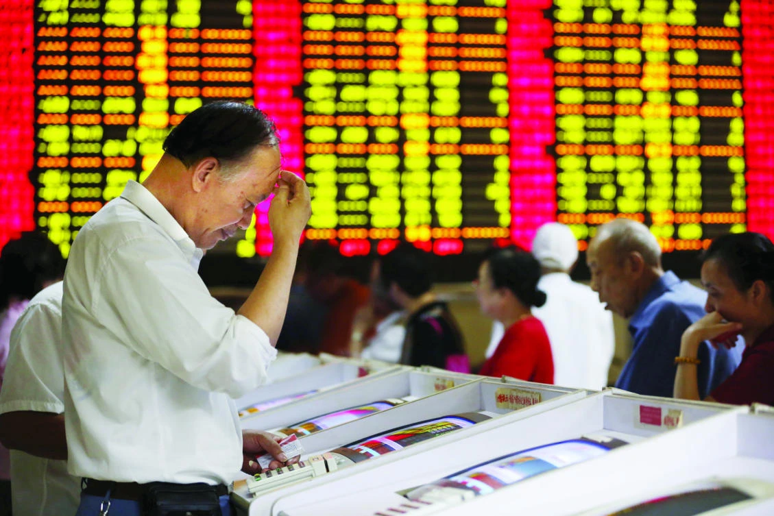 In the spot market, the yuan opened at 6.9052 per dollar and was changing hands at 6.9083 at midday, 47 pips stronger than the previous late session close but 0.14 percent weaker than the midpoint. (Reuters)