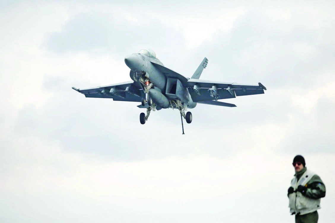 A US F18 fighter jet approaches the deck of US aircraft carrier USS Carl Vinson during an annual joint military exercise called “Foal Eagle” between South Korea and US, in the
East Sea, on Tuesday. (Reuters)