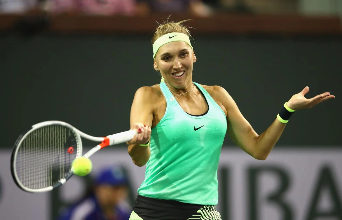 Elena Vesnina plays a forehand against Angelique Kerber in their fourth round match in Indian Wells, California, on Tuesday night. (AFP)
