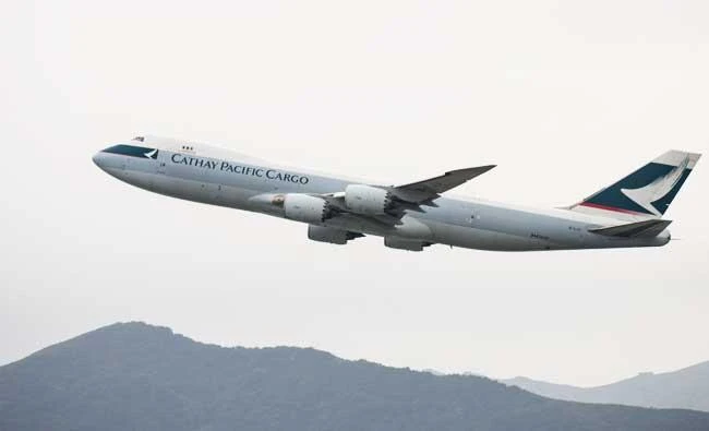 A Cathay Pacific Cargo aircraft takes off from the international airport in Hong Kong on Wednesday. (AFP)