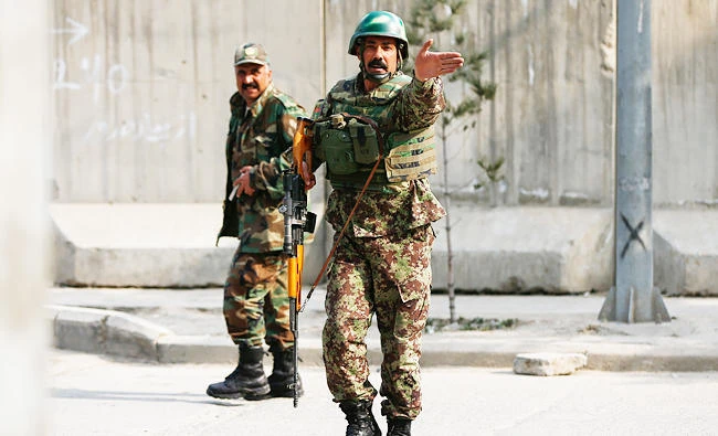 Afghan National Army (ANA) soldiers keep watch outside a military hospital in Kabul, Afghanistan, in this March 8, 2017 photo. (REUTERS)