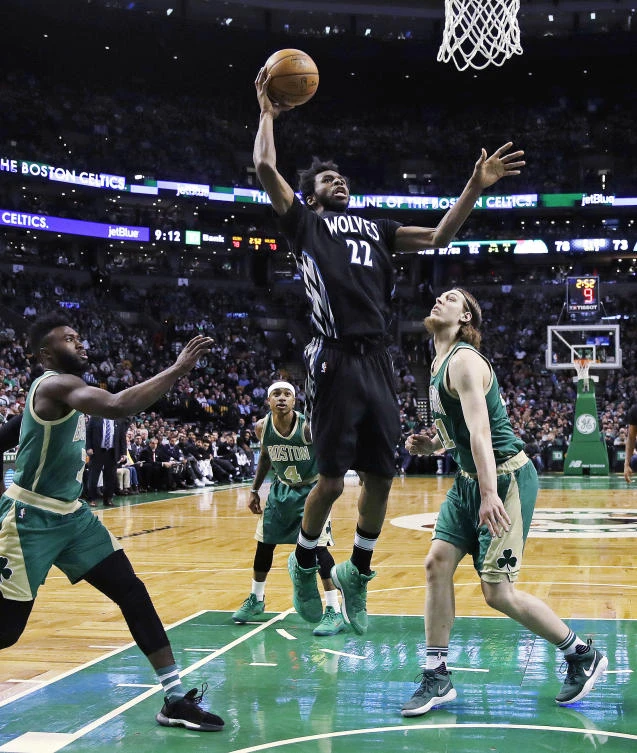 Minnesota Timberwolves forward Andrew Wiggins (22) lines up a dunk against the Boston Celtics during the second half of an NBA game in Boston on Wednesday. (AP)