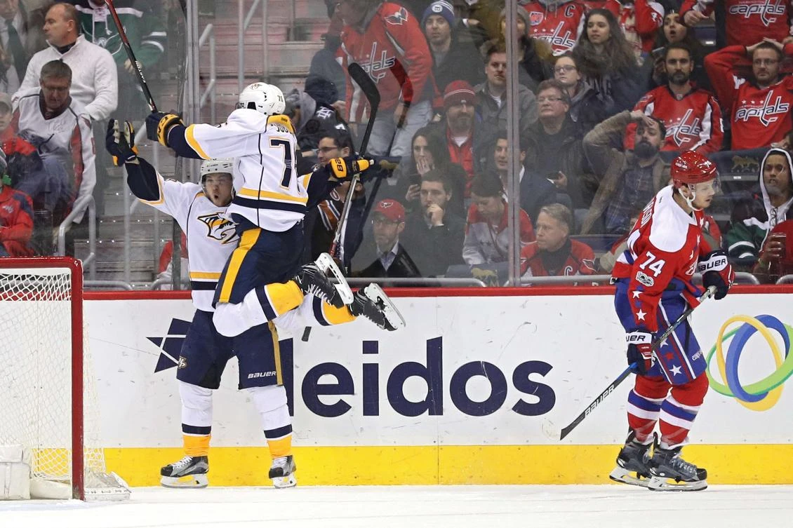 Viktor Arvidsson (38) of the Nashville Predators celebrates with teammate P.K. Subban (76) after scoring the game-winning goal against the Washington Capitals during overtime at Verizon Center in Washington, DC, on Thursday night. (AFP)