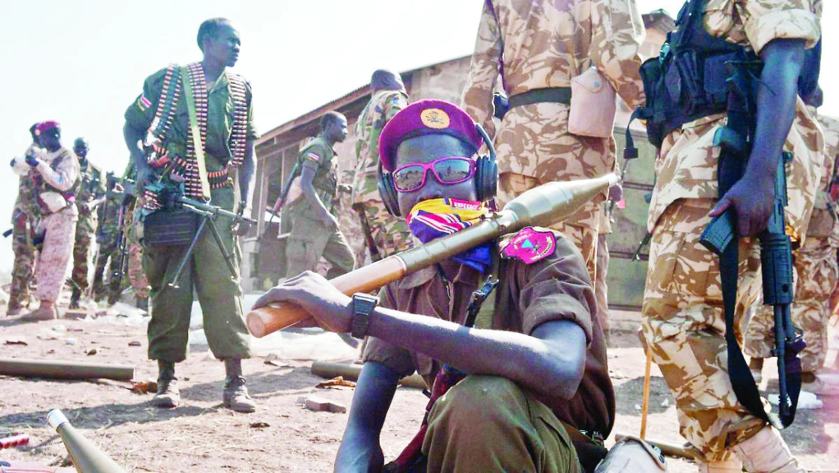 Government troops wait to board trucks and pickups near Bar, South Sudan, in this file photo. (AP)