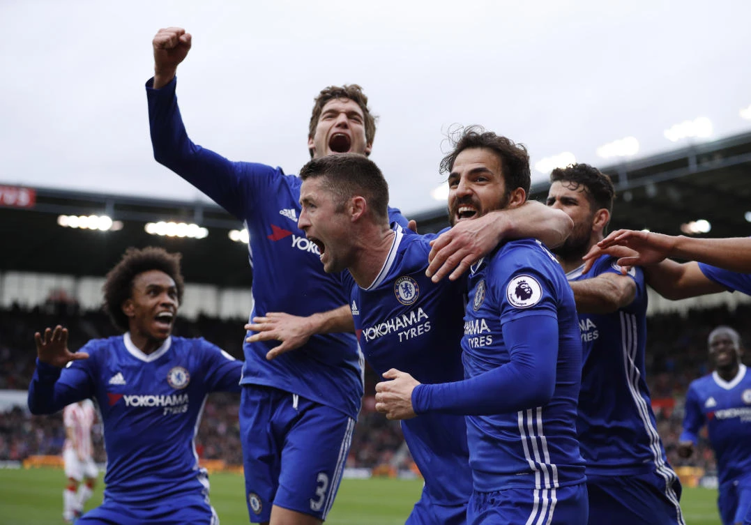 Chelsea beats Stoke 2-1 through late Cahill goal