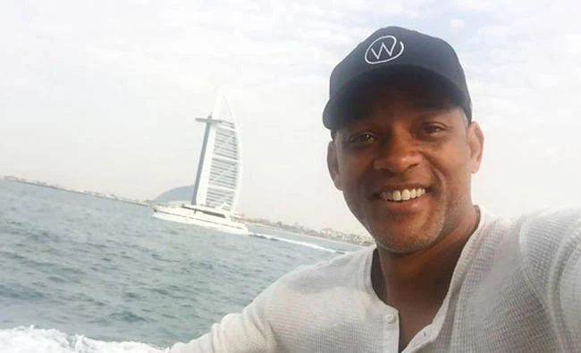 Will Smith shared a photo from the sea, cruising around Dubai with the iconic Burj Al Arab in the background.