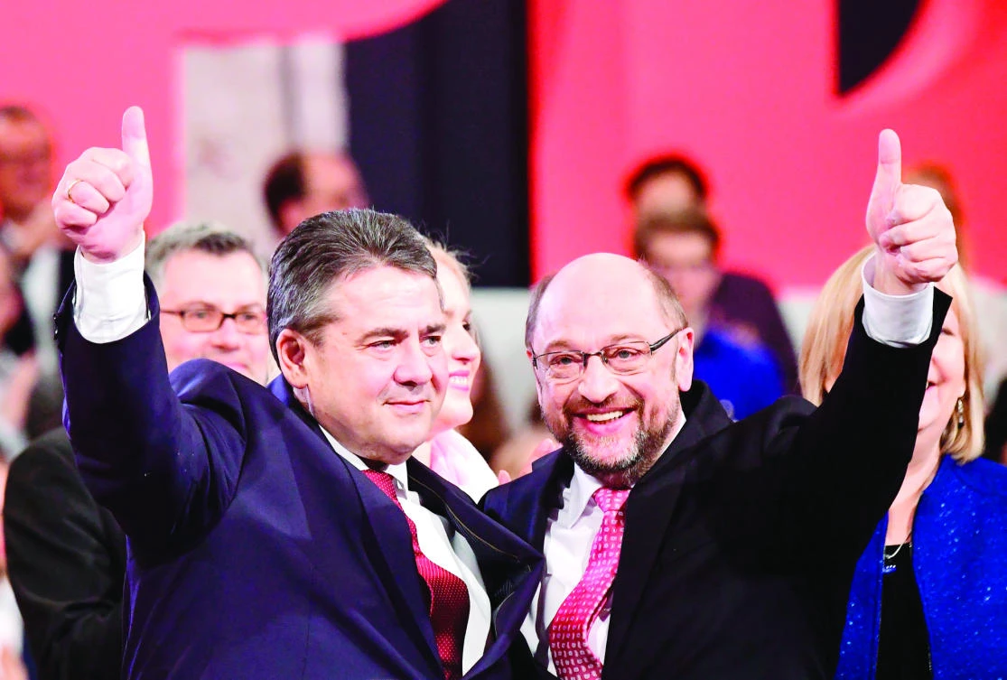 German Vice Chancellor and Foreign Minister Sigmar Gabriel with Martin Schulz, candidate for chancellor of Germany’s social democratic SPD party, at the SPD Congress on Sunday. (AFP)