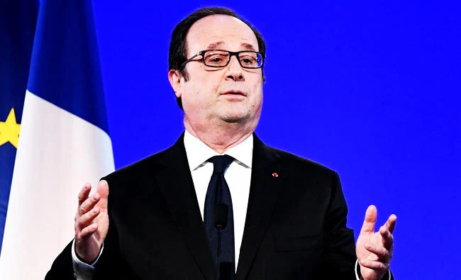France's President Francois Hollande speaks at an event concerning citizen engagement on Saturday in Crolles, southeast France. (AFP)