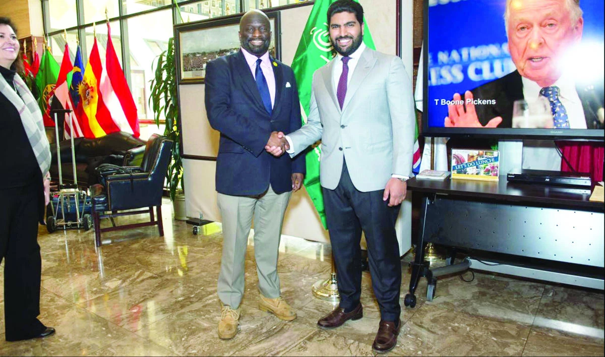 Prince Badr bin Abdullah bin Mohammed bin Farhan Al-Saud, chairman of the Saudi Research and Marketing Group (SRMG), with Jeffrey Ballou, president of the National Press Club, in Washington.