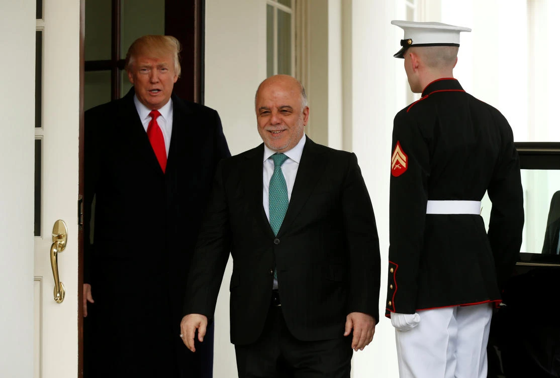 US President Donald Trump greets Iraqi Prime Minister Haider Al-Abadi at the White House in Washington. (REUTERS)