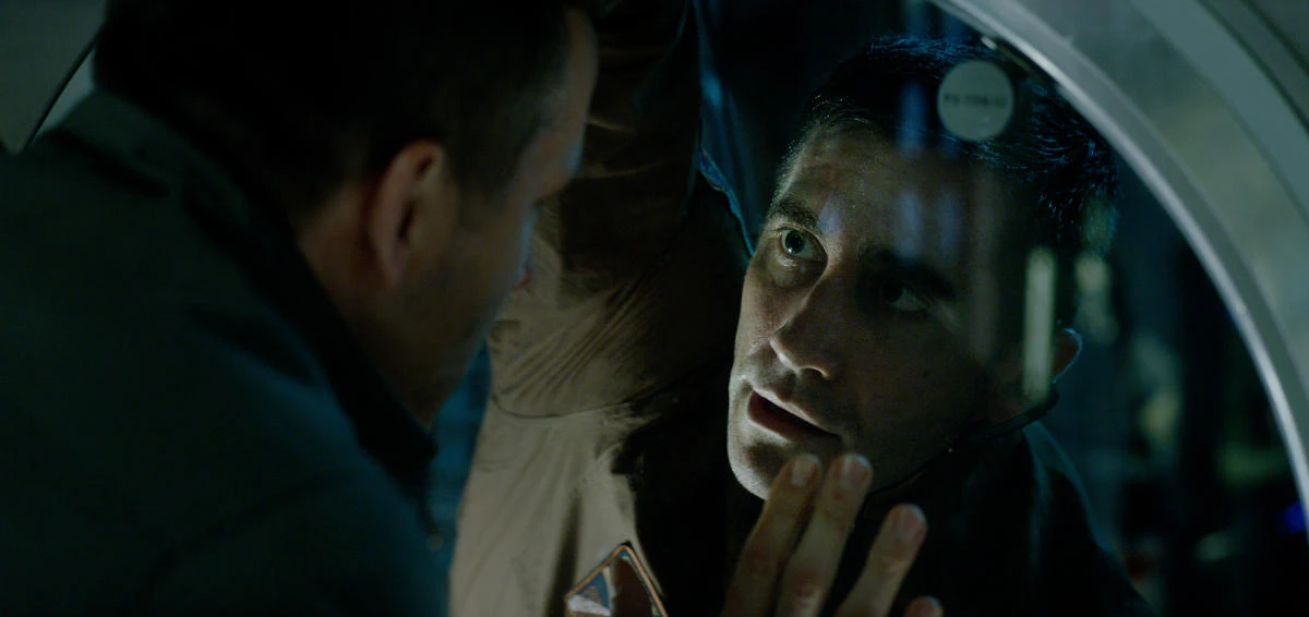 Ryan Reynolds, left, and Jake Gyllenhaal appear in a scene from, "Life." (Columbia Pictures-Sony via AP)