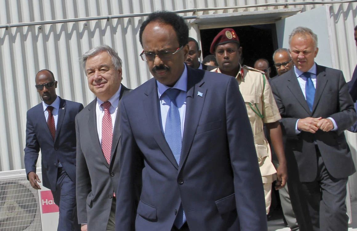 Somali president Mohamed Abdullahi Mohamed, centre, walks with UN Secretary-General Antonio Guterres, 2nd left, inside the UN compound in Mogadishu, Somalia. (AP)