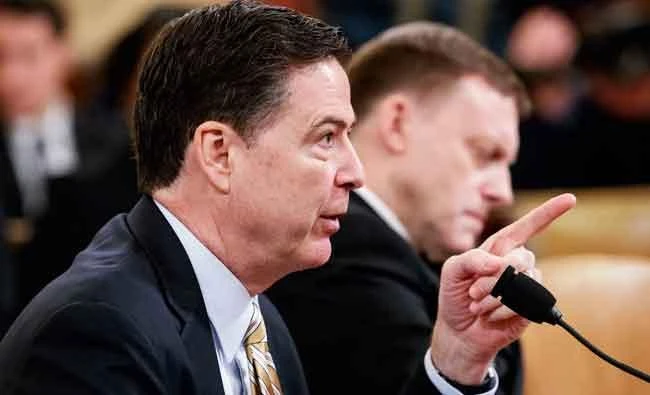 FBI Director James Comey, left, and National Security Agency Director Michael Rogers, testify on Capitol Hill in Washington, on Monday, before the House Intelligence Committee hearing on allegations of Russian interference in the 2016 U.S. presidential election. (AP)