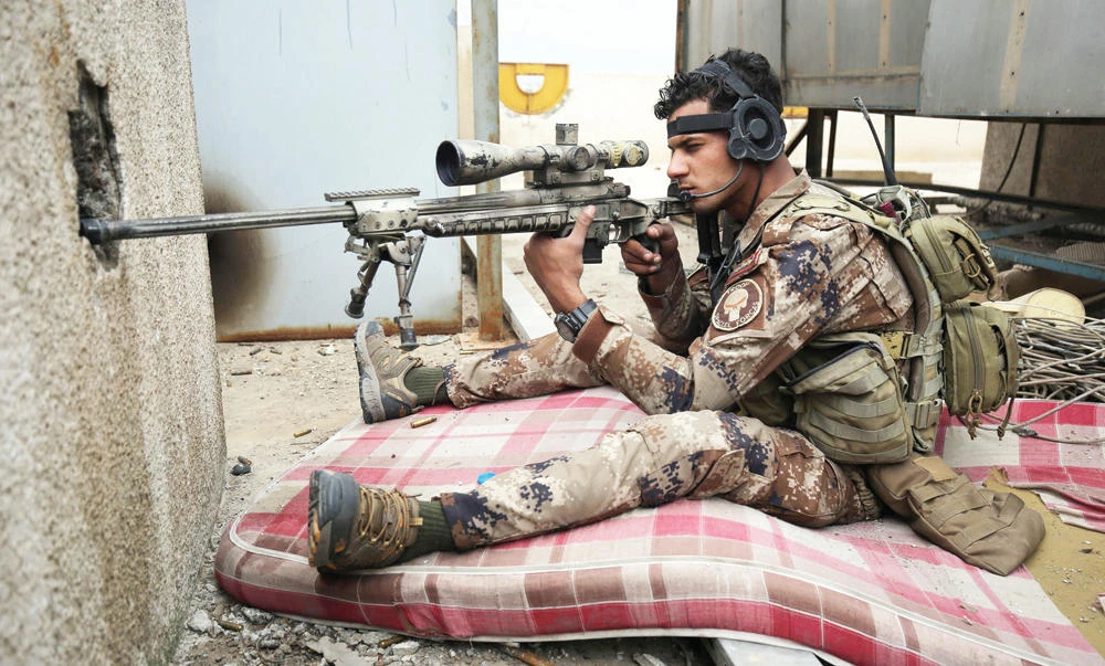 A sniper takes aim during Iraqi forces’ advance in western Mosul’s Old City during the offensive to retake the city from Daesh. (AFP)