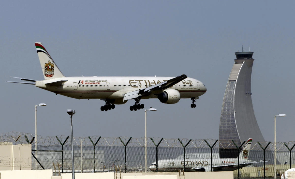 An Etihad Airways plane prepares to land at the Abu Dhabi airport. (AP)