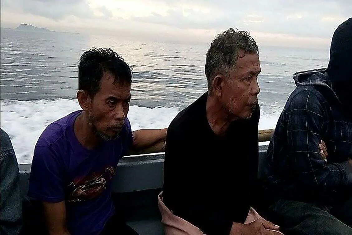 The two Malaysians, kidnapped by extremists last year. (AFP)