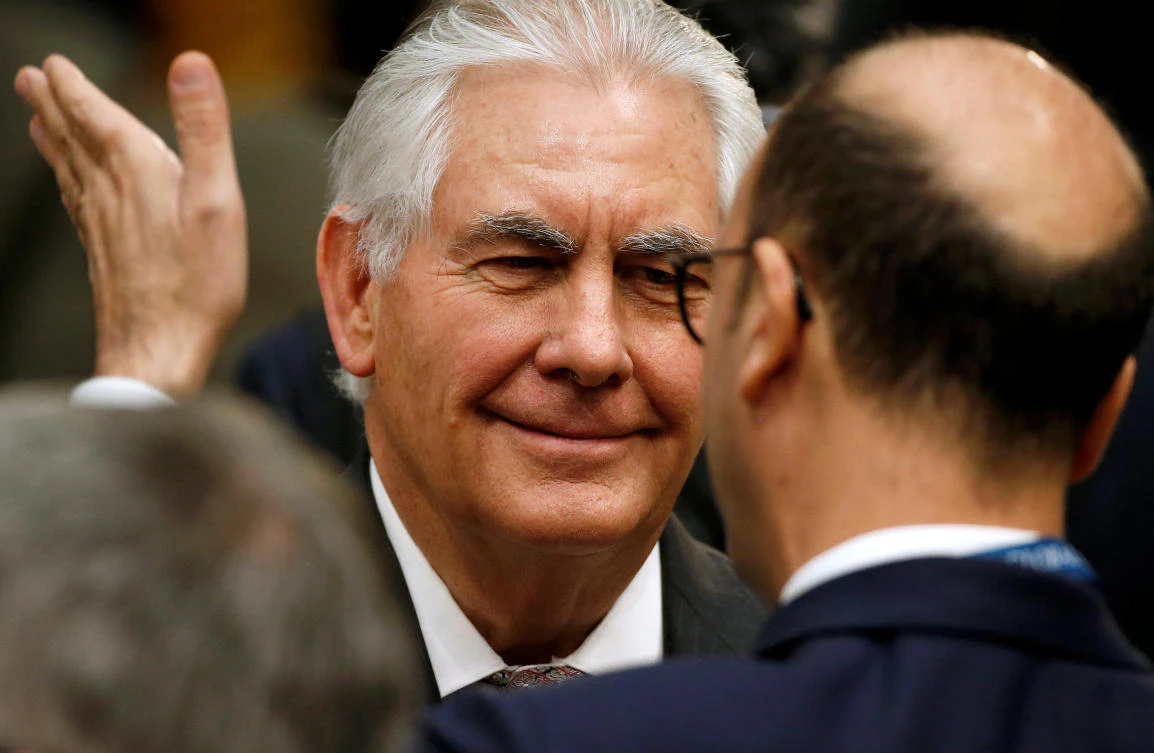 US Secretary of State Rex Tillerson speaks with a delegate. (Reuters)