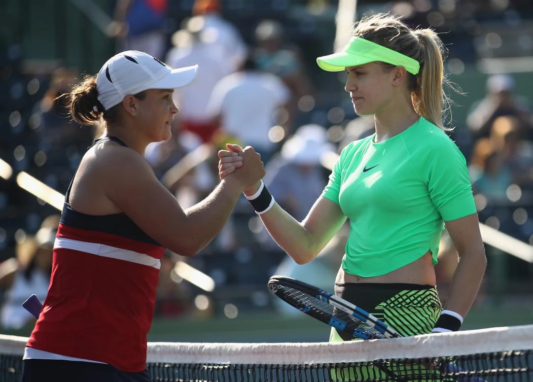 Eugenie Bouchard congratulates Ashleigh Barty after she won in three sets at Crandon Park Tennis Center in Key Biscayne, Florida, on Wednesday night. (AFP)