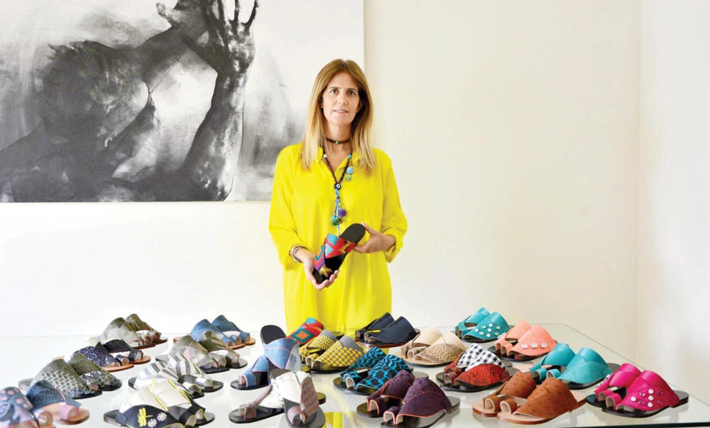 Monica Suitt with her collection of Madas for women.