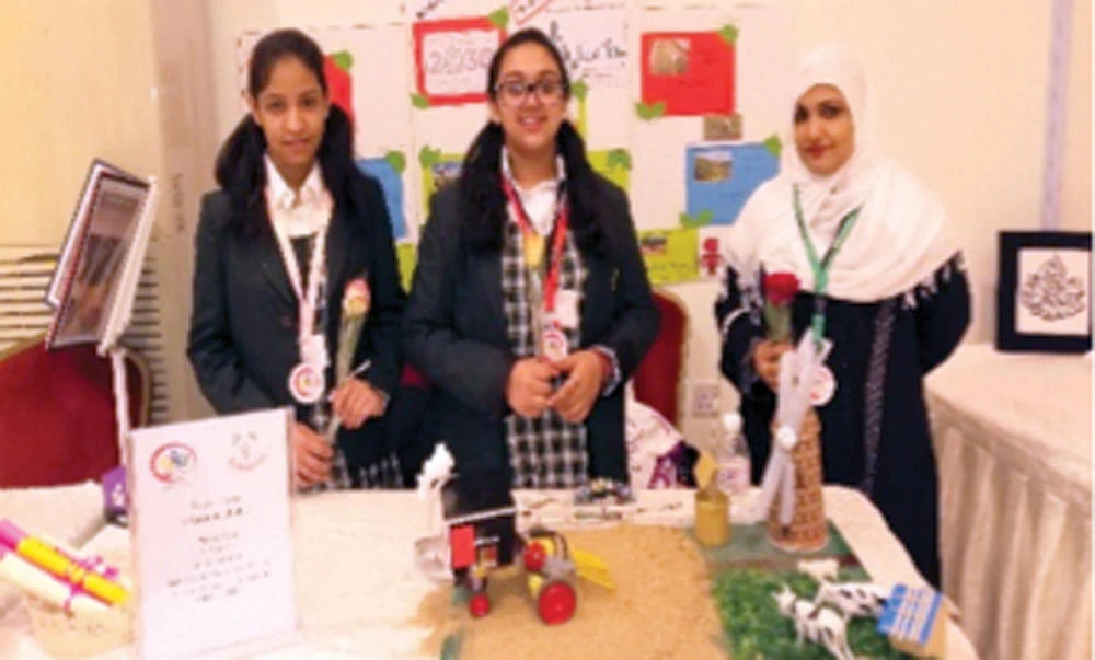 Al-Wurood students with their project. (AN photo)