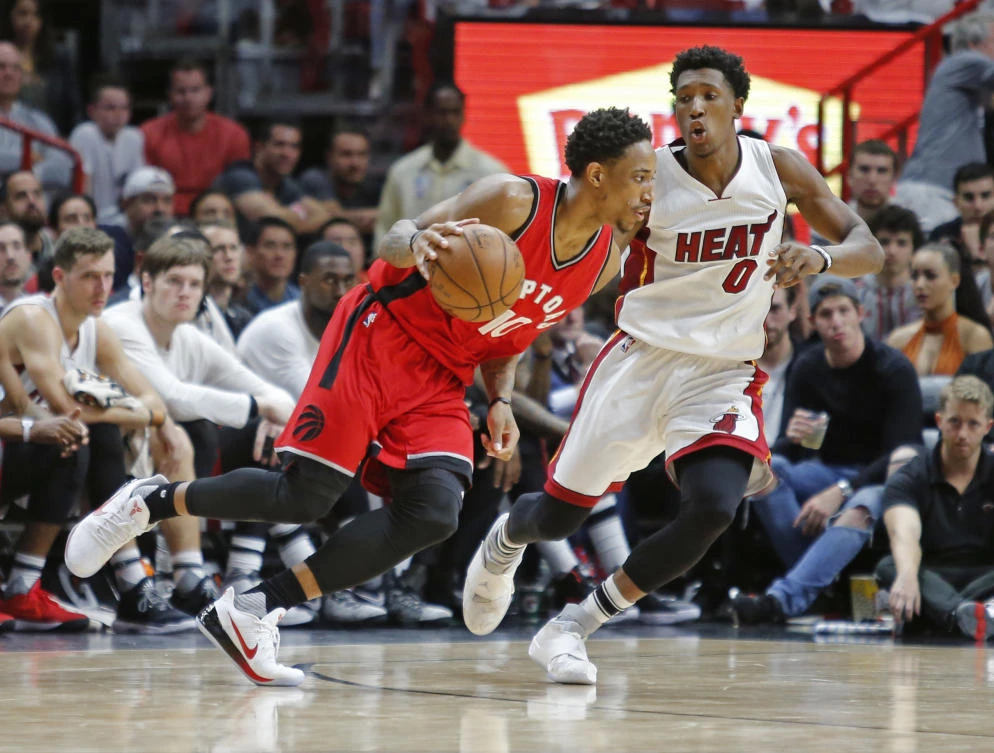 Toronto Raptors guard DeMar DeRozan (10) drives to the basket past Miami Heat guard Josh Richardson (0) in the second half of their NBA basketball game in Miami on Thursday night. (AP)