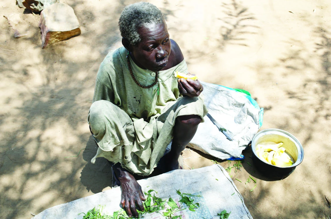 A refugee eats fruit at a camp for those who were previously displaced by fighting, in Rajaf, South Sudan. More than 5 million people in South Sudan do not have access to safe, clean water, compounding the problems of famine and civil war, according to UNICEF. (AP)