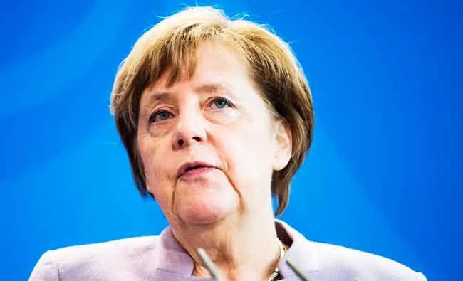 German Chancellor Angela Merkel attends a press conference ahead of talks with Mahmoud Abbas, President of the Palestinian National Authority (Unseen) on the Israeli-Palestinian conflict at the chancellery in Berlin, on Friday. (AFP)