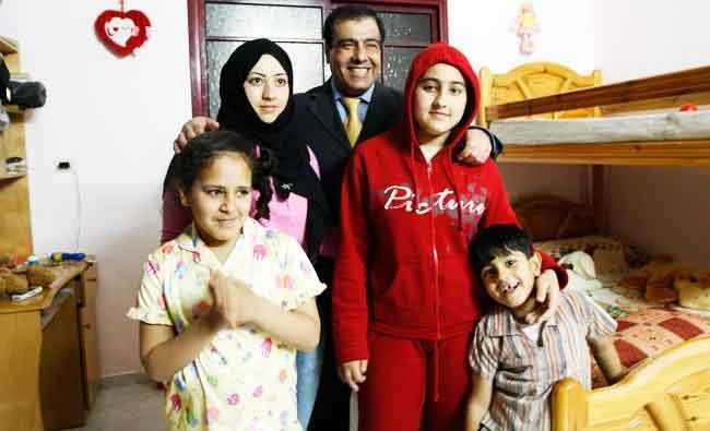 In this May 7, 2009 photo, Dr. Izzeldin Abuelaish is seen with his children at his house in Jebaliya, Gaza Strip. (AP)