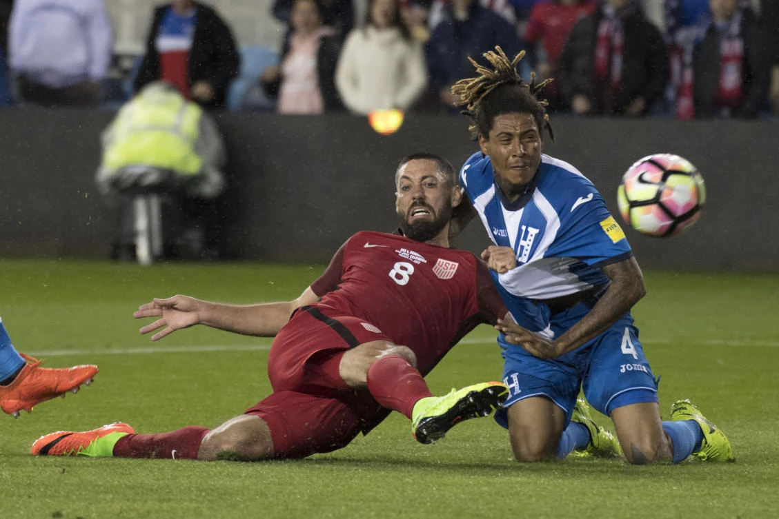 US forward Clint Dempsey (8) scores against Honduras defender Henry Figueroa (4) during the first half of the World Cup Soccer Qualifier at Avaya Stadium on Friday night. (USA TODAY Sports)