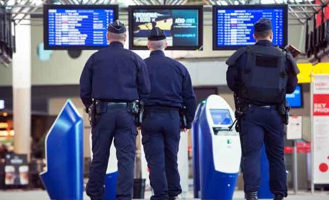 French police officers patrol at the Marseille Provence airport in Marignane, in this March 22, 2016 file photo, as security measures were reinforced in the wake of attacks in Brussels. (AFP)