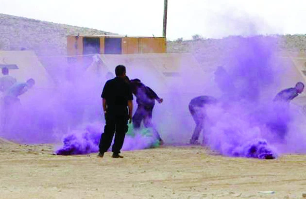 Soldiers take part in a military exercise simulating a chemical weapons attack. (AFP)