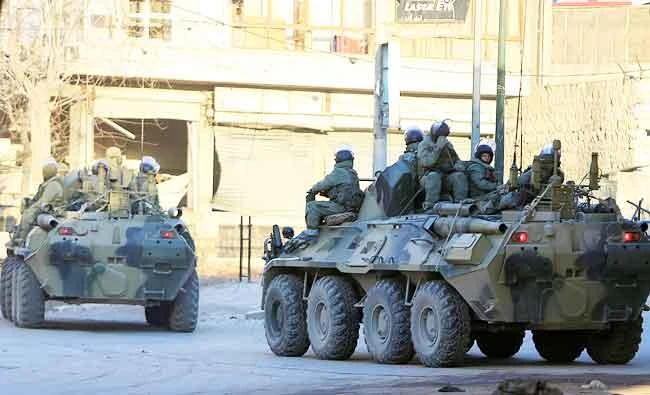 Russian soldiers, on armoured vehicles, patrol a street in Aleppo, Syria, in this February 2, 2017 photo. (REUTERS)
