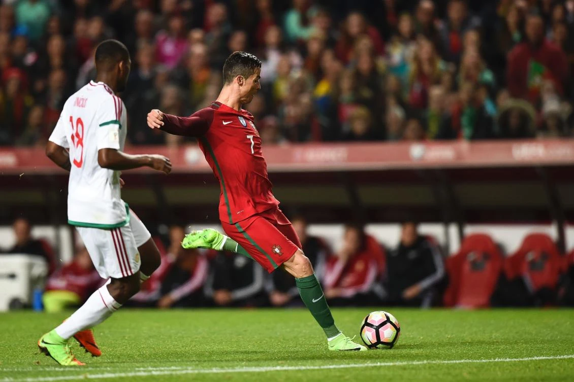Portugal's forward Cristiano Ronaldo kicks the ball to score during the WC 2018 group B football qualifing match Portugal vs. Hungary at the Luz stadium in Lisbon on Sunday. (AFP)
