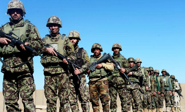 In this photo taken on February 9, 2017, Afghan National Army (ANA) soldiers march during a training by Italian soldiers from NATO's Resolute Support Mission at the Kabul Military Training centre on the outskirts of Herat. (AFP)